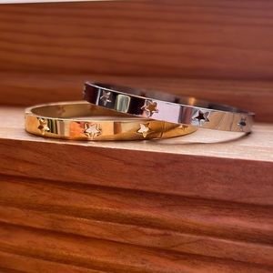 Mock Hermes gold and silver star bracelet set